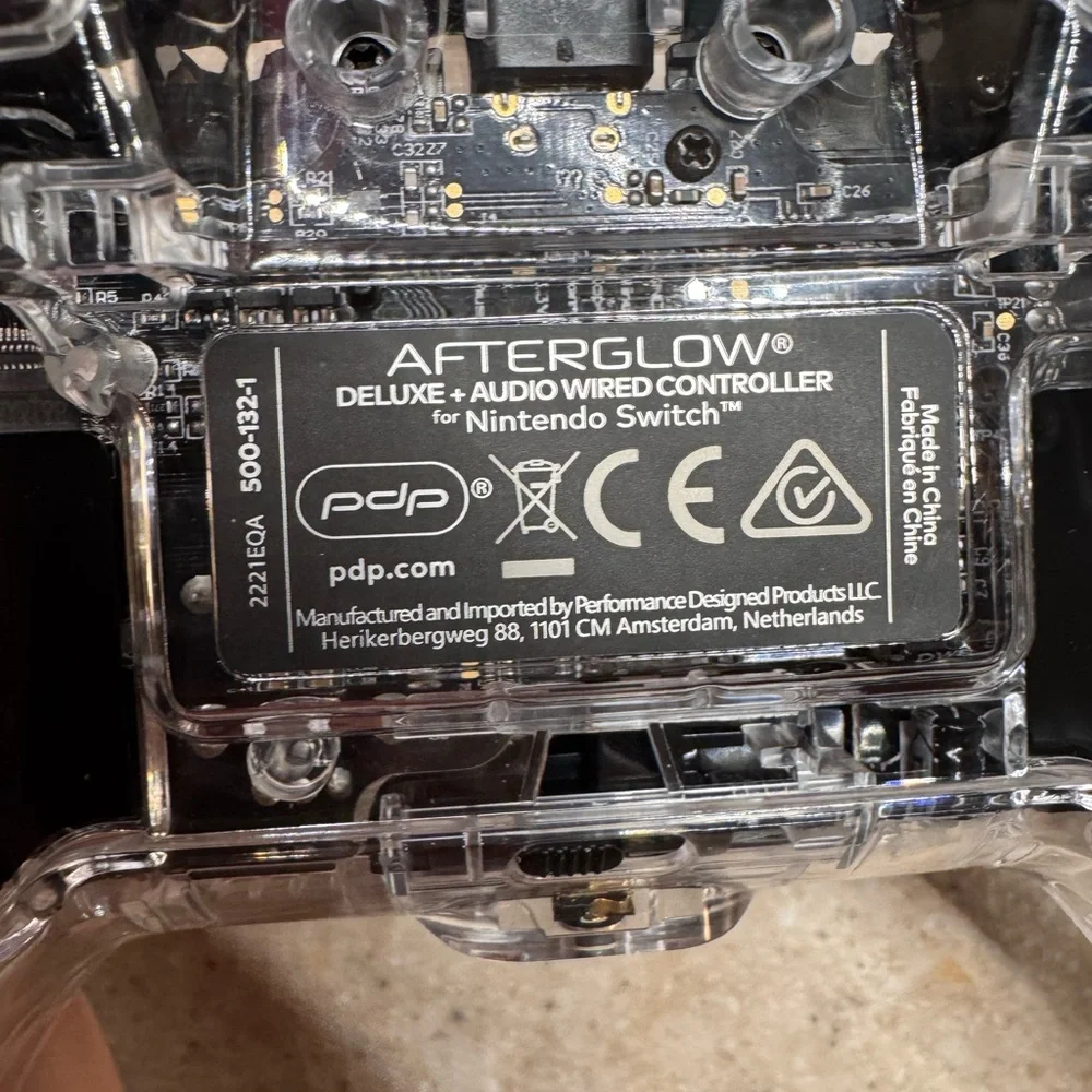 Nintendo Switch Afterglow Deluxe and Audio Wired Controller